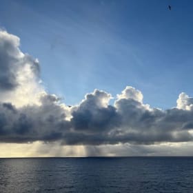 #19. Framed Photo "Sun Behind Clouds" item