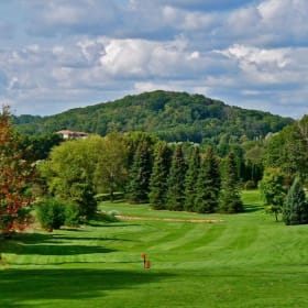 Item #4: Christmas Mountain Village Golf Package item