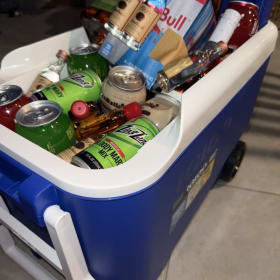 31. Blue ice chest with liquor item