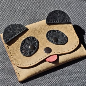 Tan panda coin purse item