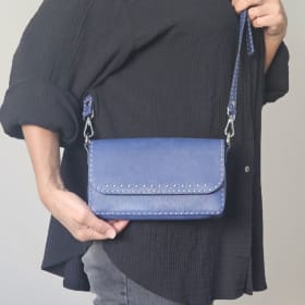 Cross-body wallet with sides. Denim blue item