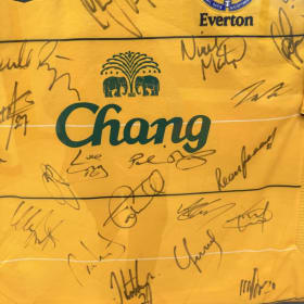 Signed and framed Everton top item