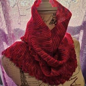 Hand Knitted Scarf by Carol item