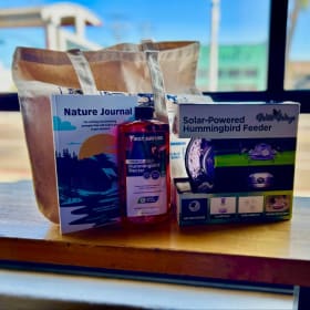 Wild Wings solar-powered hummingbird feeder, nectar, & tote item