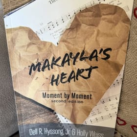 77 - Hyssongs - Autographed Book with Pillows item