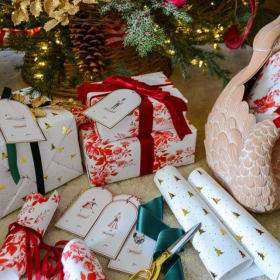 Wrapping Station Basket — gift wrap, ribbons, tags, tape, an item