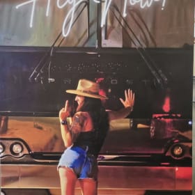 📸 Iconic Rebellion: Margie Henson's "Hey Now!" Moment item
