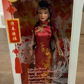 28 Chinese New Year Barbie Collector’s doll - valued at $100 item