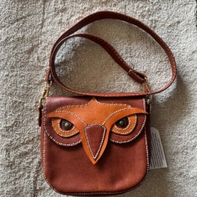 Brown leather purse with owl face item