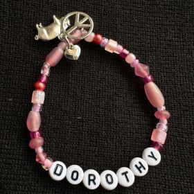 Dorothy Peace, Love, & Pigs Friendship Bracelet item