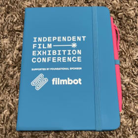 INDEPENDENT FILM CONFERENCE/FILMBOT SMALL NOTEBOOK & PEN NEW item