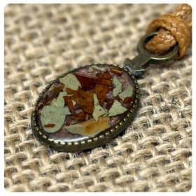 Falling in Love: Karl & Katniss | Oval Pendant Necklace item