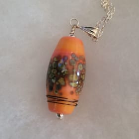 Heated glass necklace item