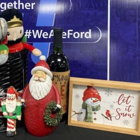 Frosty's Black Straw Hat Filled With Christmas Goodies item