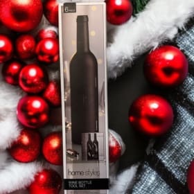 Giant Tiger - 8 Piece cookware set and wine bottle decor item