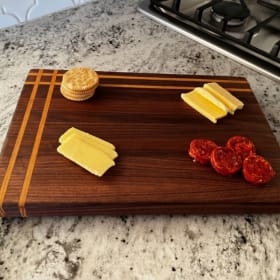Handcrafted Hardwood Cutting Board (Walnut + Osage) item