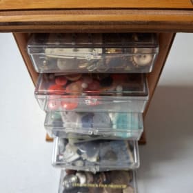 Wood cabinet w/drawers - assorted buttons item