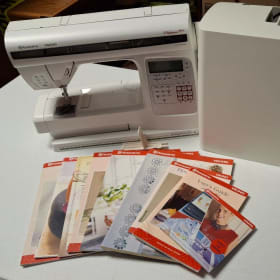 Husqvarna sewing machine & assorted manuals item