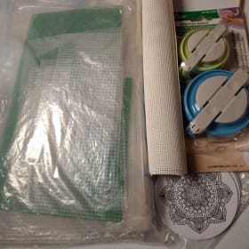 Bag of plastic canvas, pom pom makers & craft supplies item