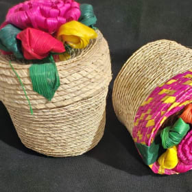 Mini palm baskets with floral tops item