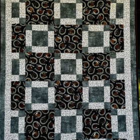 Quilt: "Horseshoes and Stars" item