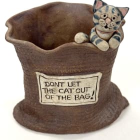 Vintage “ Don’t Let the Cat Out of the Bag” Ceramic Pot item