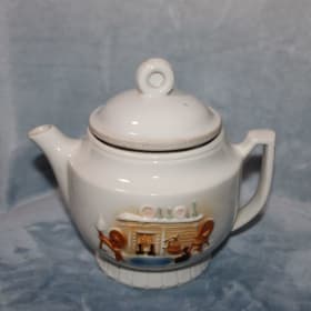 Vintage Procelain Teapot with Raised Hearth & Kitchen Motif item
