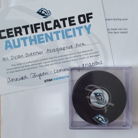 Signed Hockey Puck by Dylan Guenther, Utah Mammoth item