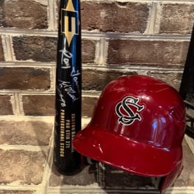 Univ. of SC Official CWS Autographed Bat  & Practice Helmet item