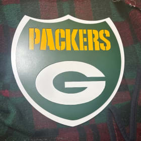 Item #20: Second of two Green Bay Packers Shields item