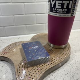 Yeti 20 oz mug, Wooden crib board, Pink Weasel Coffee item