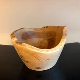 Hand Turned Maple Bowl with asymmetrical edge item