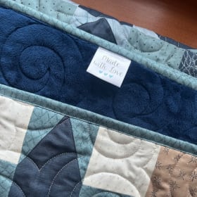 “Handmade Quilt by Rock Creek Schoolhouse Alum” Value: $750 item