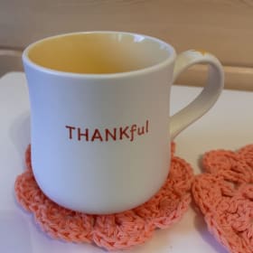 Peach Crocheted Coasters (Set of 2) item