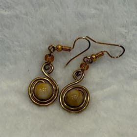 Brass and bead swirl earring (item 26) item