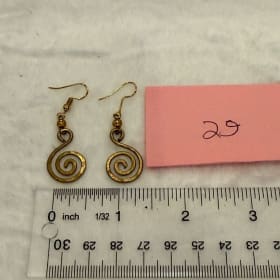 Brass swirl earring item