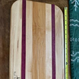 hand crafted cutting board with purple heart (item 73) item