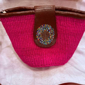 32: Pink sisal hand bag with bead detail item