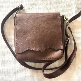 Natural-styled leather cross-body bag item