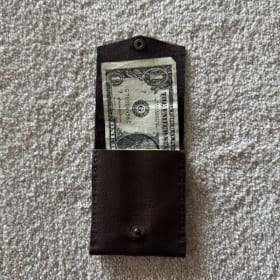 Small leather wallet item