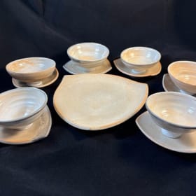 Handmade porcelain tea bowls and serving plate item