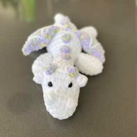 Crochet white and purple dragon item