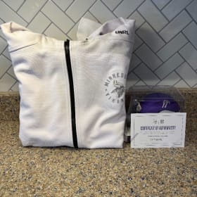 UNRL Hoodie + Signed JJ McCarthy Mini Helmet item