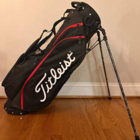 Titleist golf bag and $150 gift card to X golf item