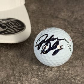 John Daly signed ball & hat item