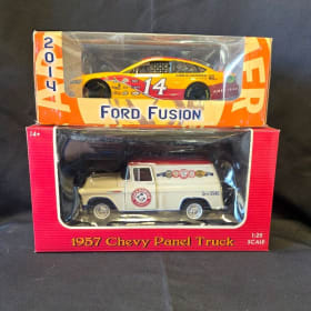 1957 Chevy Panel Truck and 2014 Ford Fusion die cast item