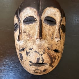 Stillness of Many — Hand-Carved Three-Face Mask item