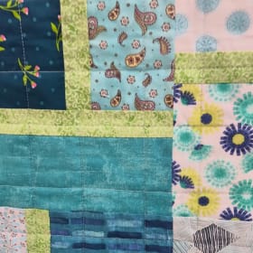 Aqua and Green Geometric and Floral Quilt 54" X 71.5" item
