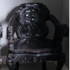 Pair of dark carved hardwood armchairs (matching style two) item