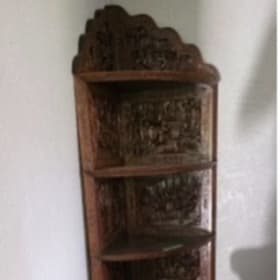 Tall carved corner shelving/display unit item